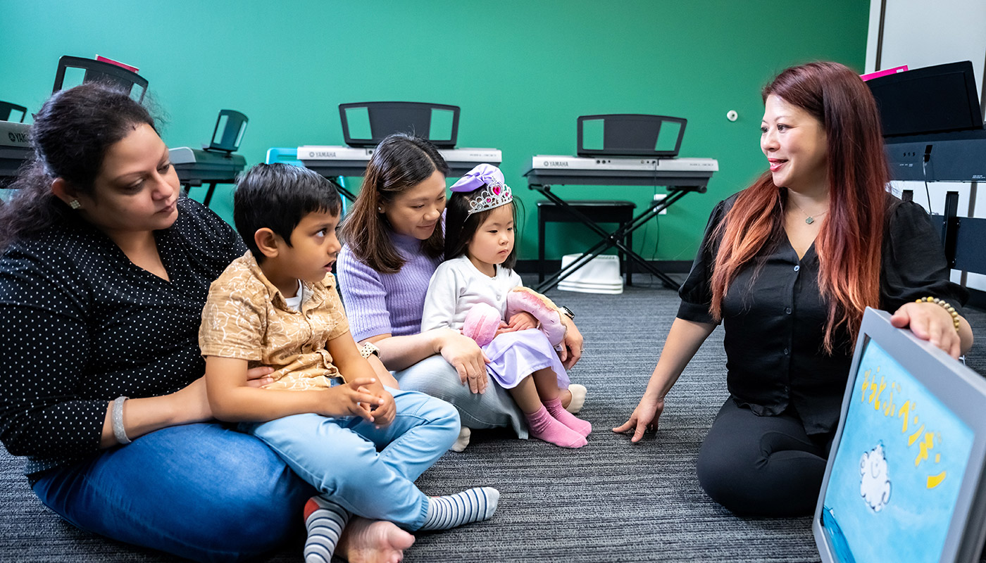 Preschool music class with parent